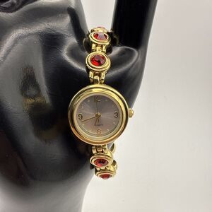 New Gold Watch With Red Jewels